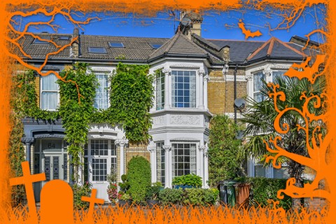 Exterior of a home with period features and ivy