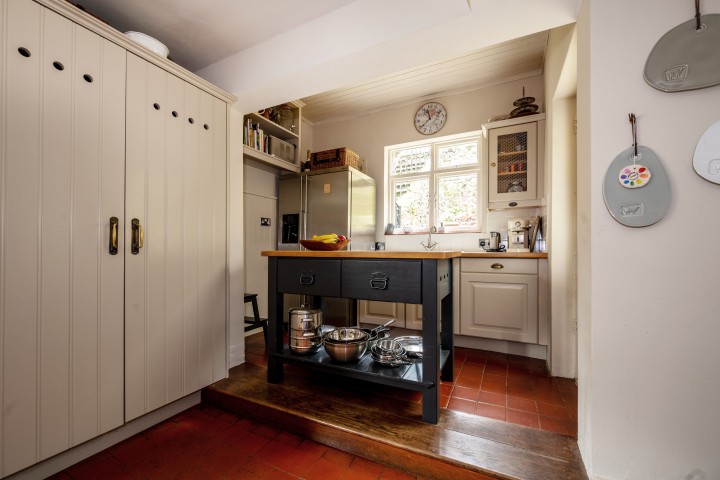 Modern cabinets and stylish storage in a classic cottage kitchen